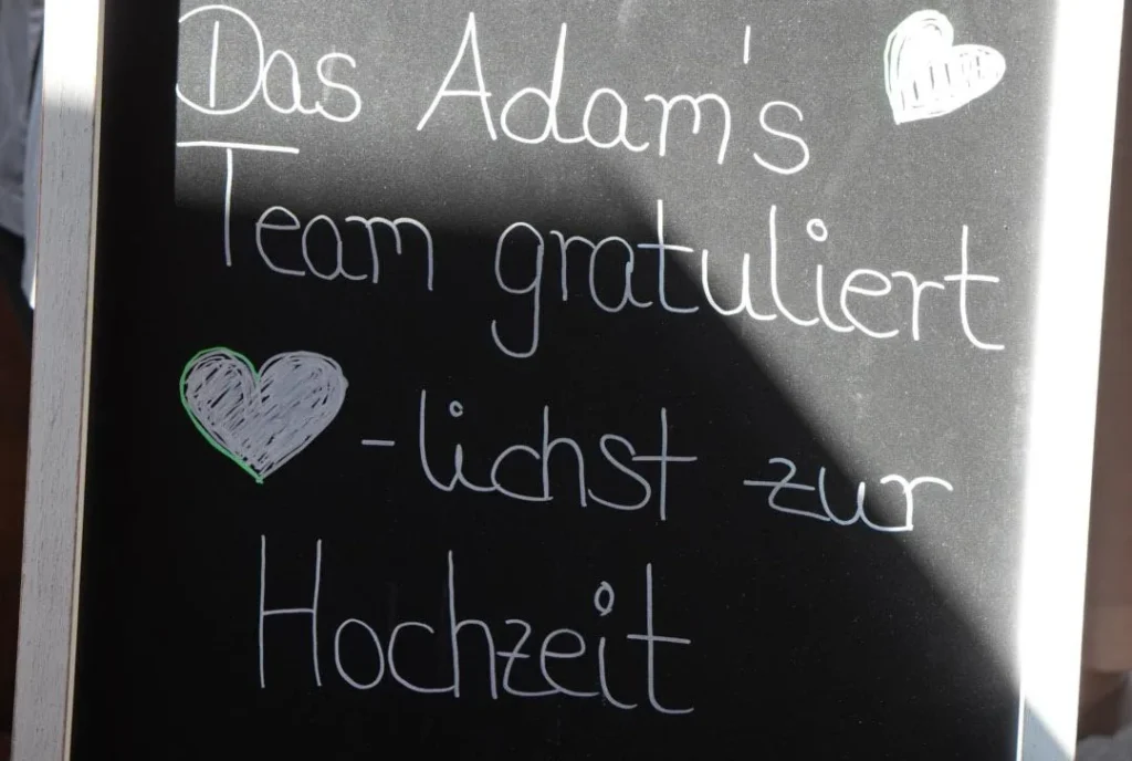 Congratulations board from the Adam’s team for a wedding